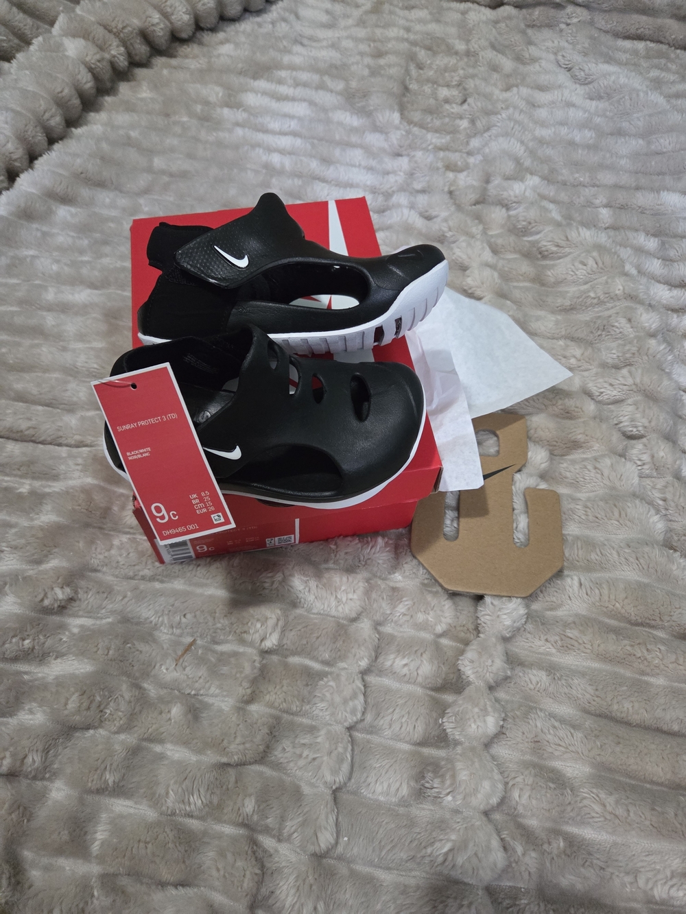Nike Kids Black and White Slip-On Sandals with Strap